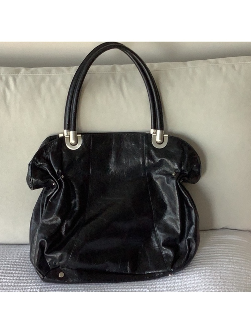 Classic Black Leather Shoulder Bag with Silver Accents